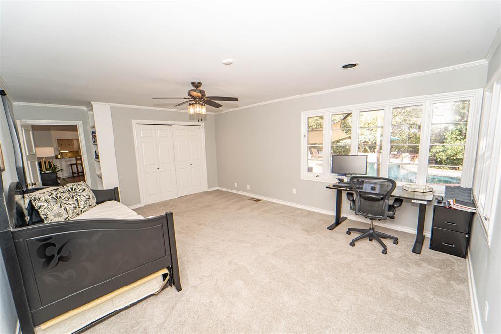 4 Sendero Road Breckenridge, TX 76424 - Photo 23 of 38 Guest Bedroom#3, with ensuite and pool views! Could serve as a double primary suite!