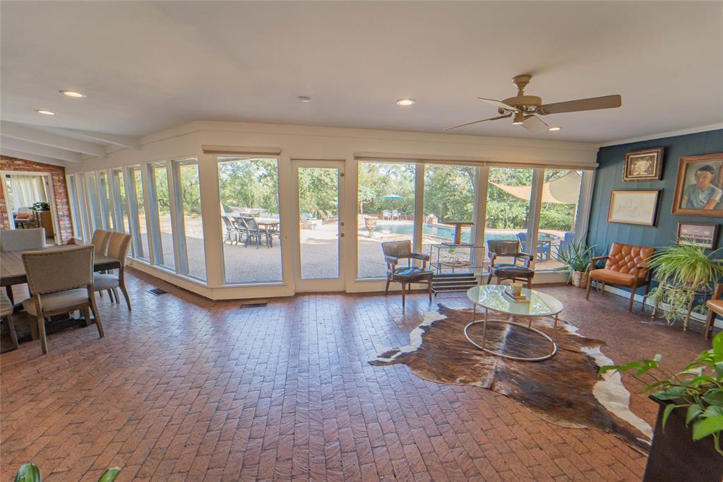 4 Sendero Road Breckenridge, TX 76424 - Photo 8 of 38 Second Living Area, adjacent to dining-light filled and overlooking the backyard oasis!