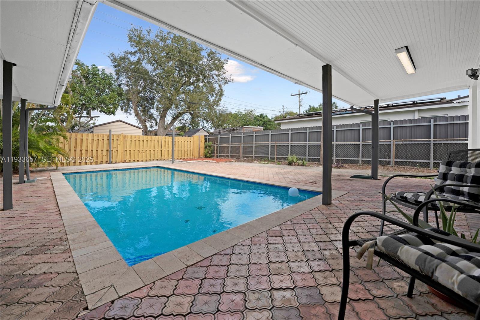 6841 Raleigh Street Hollywood, FL 33024 - Photo 1 of 41 swimming pool view with a outdoor seating