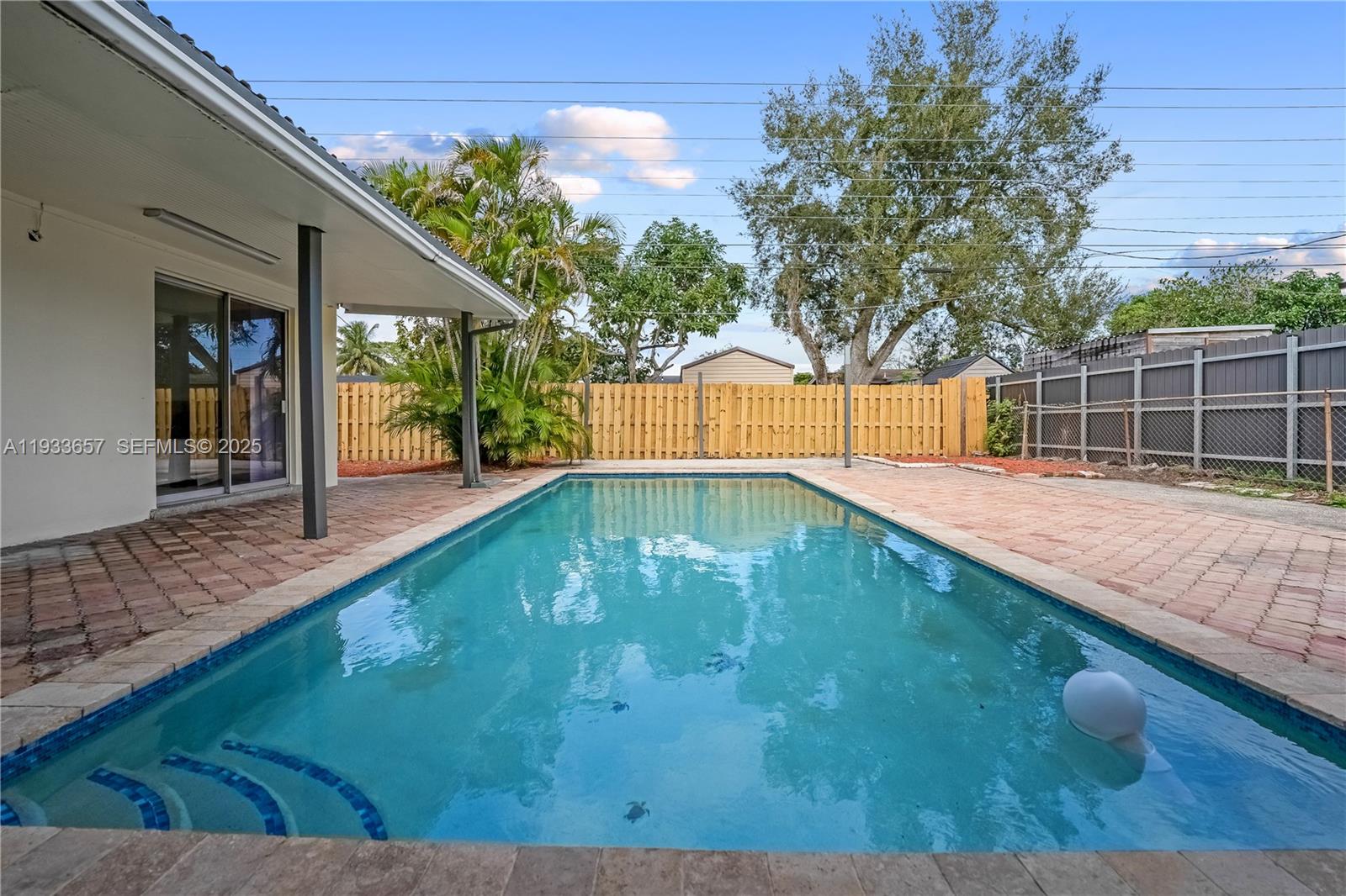 6841 Raleigh Street Hollywood, FL 33024 - Photo 18 of 41 a view of a backyard