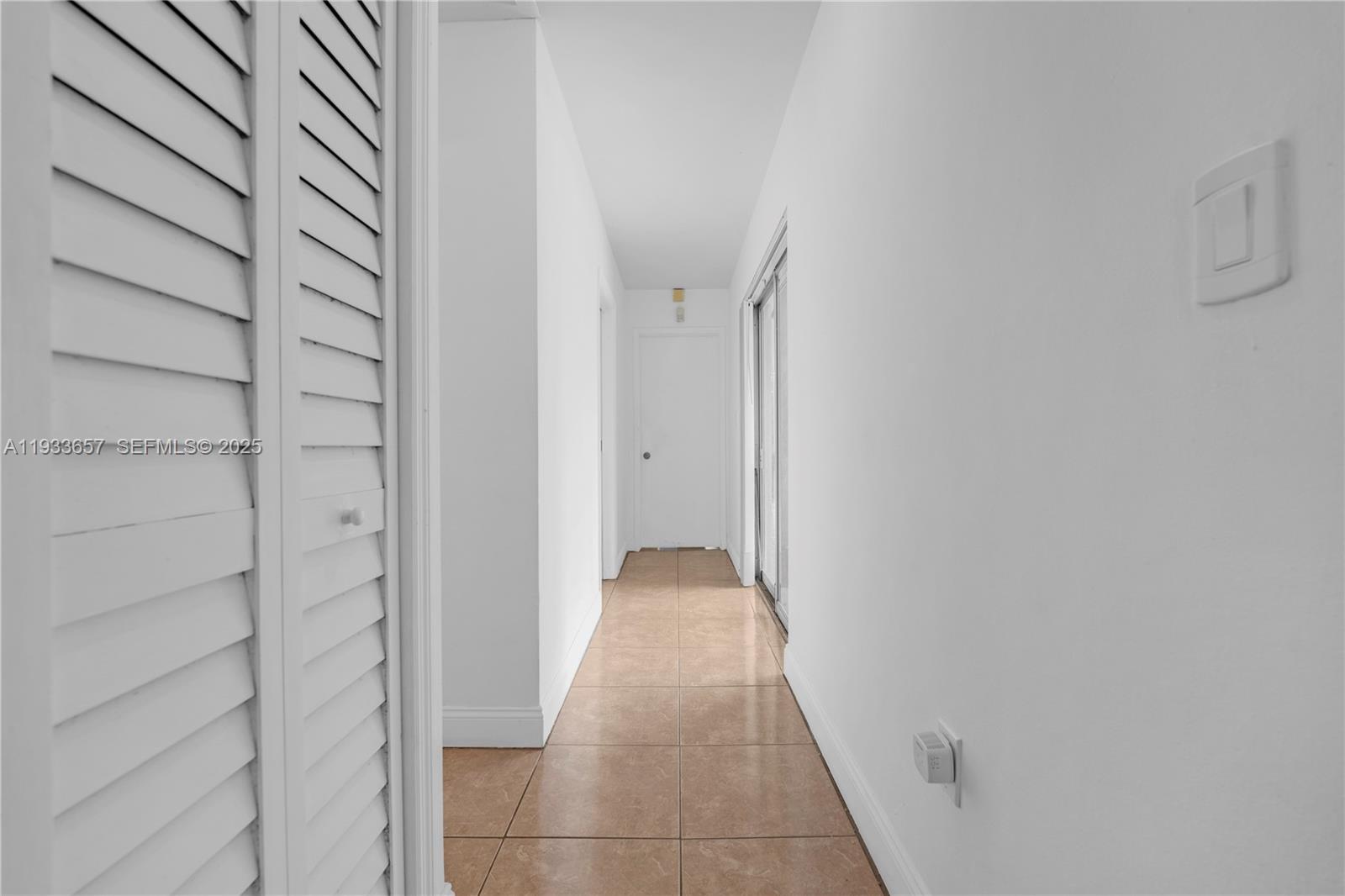 6841 Raleigh Street Hollywood, FL 33024 - Photo 27 of 41 a view of a hallway