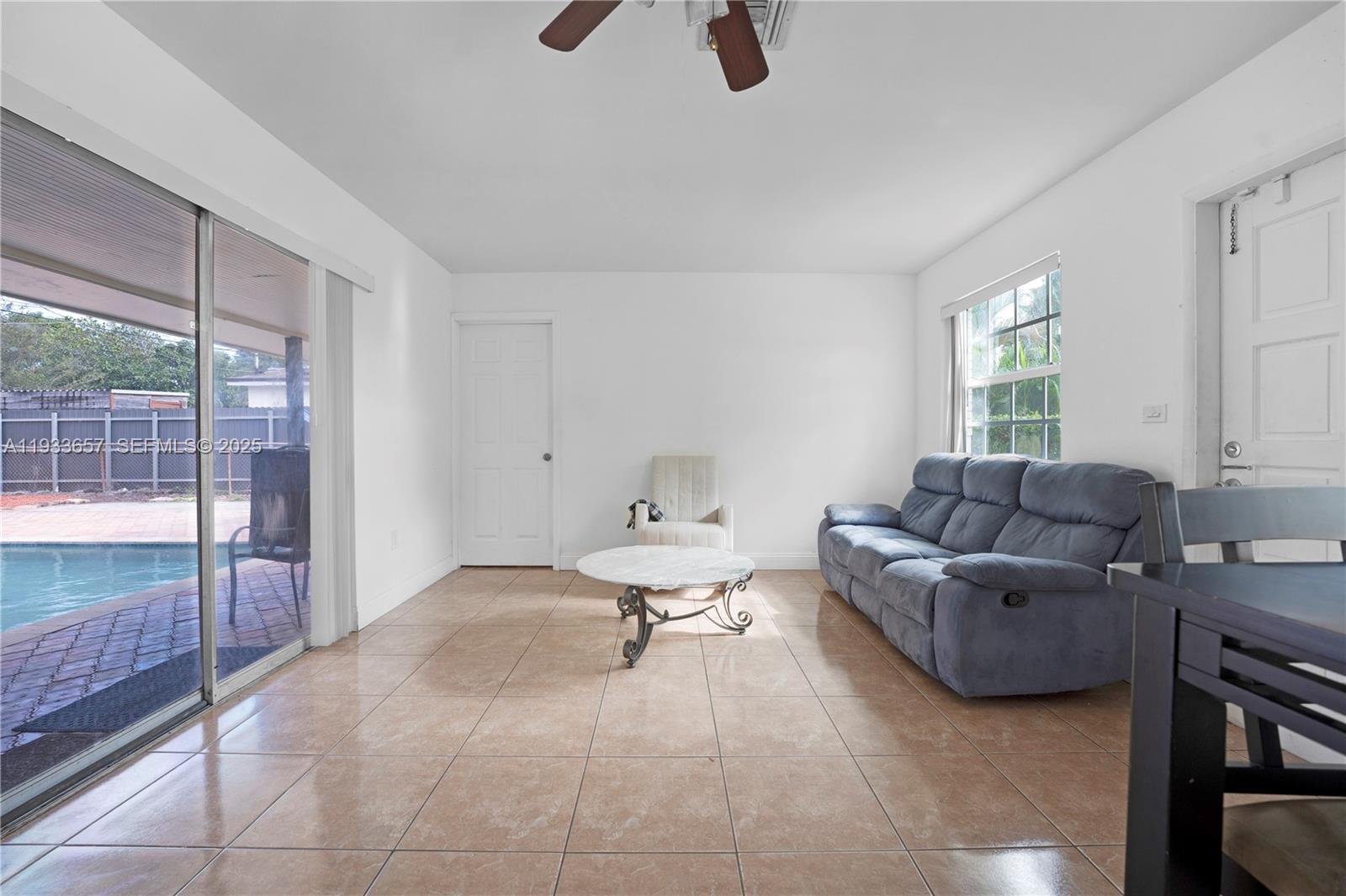 6841 Raleigh Street Hollywood, FL 33024 - Photo 28 of 41 a living room with furniture