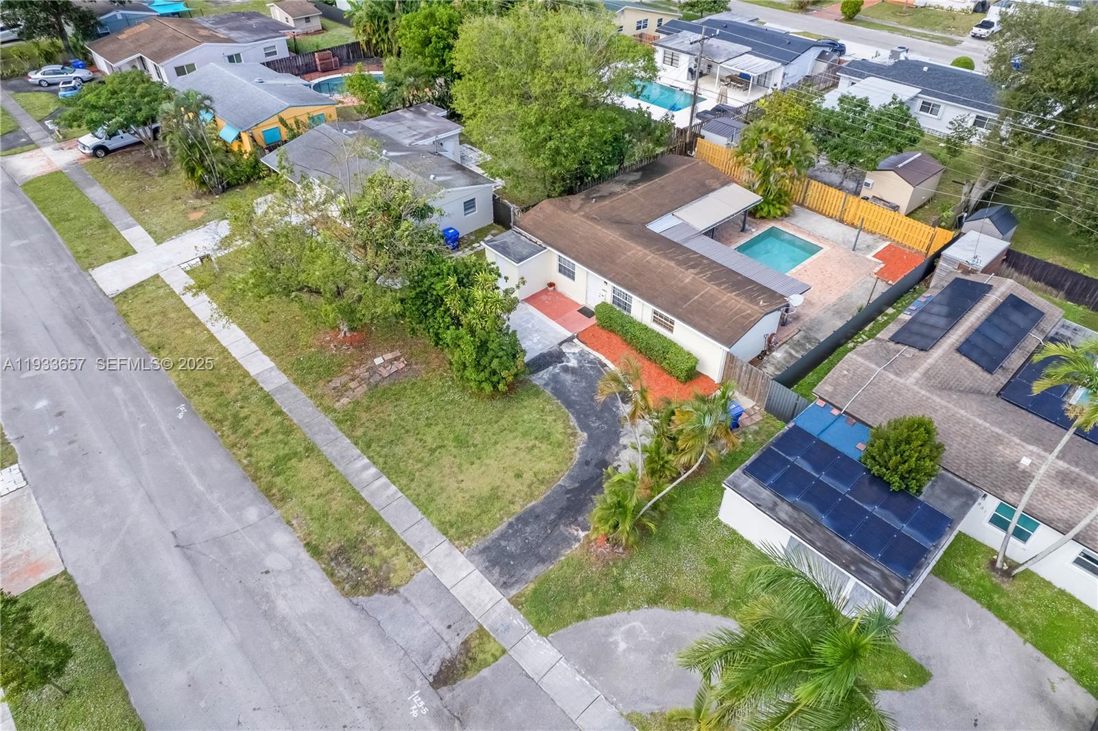 6841 Raleigh Street Hollywood, FL 33024 - Photo 37 of 41 an aerial view of residential houses with outdoor space