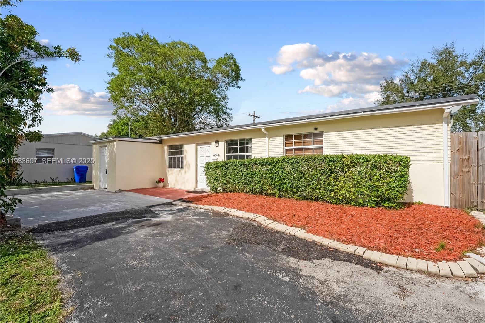6841 Raleigh Street Hollywood, FL 33024 - Photo 4 of 41 a view of a house with backyard and garden