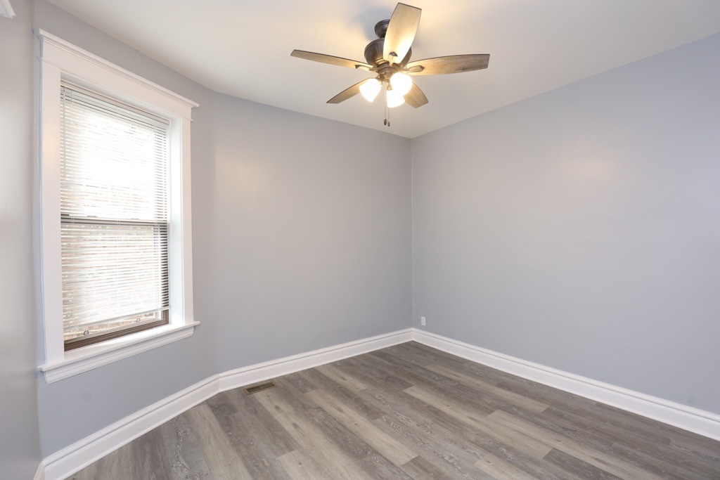 2039 West 23rd Street, Unit 1 Chicago, IL 60608 - Photo 15 of 20 an empty room with a window