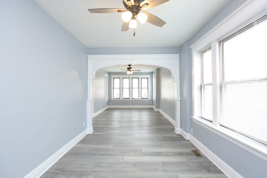 2039 West 23rd Street, Unit 1 Chicago, IL 60608 - Photo 7 of 20 a view of entryway and hall with wooden floor