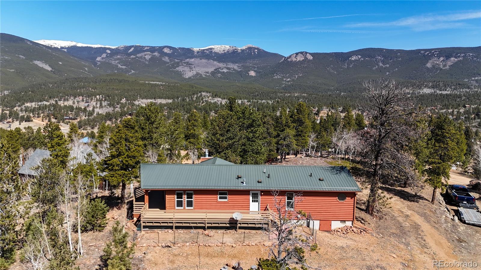 an aerial view of house with mountain view