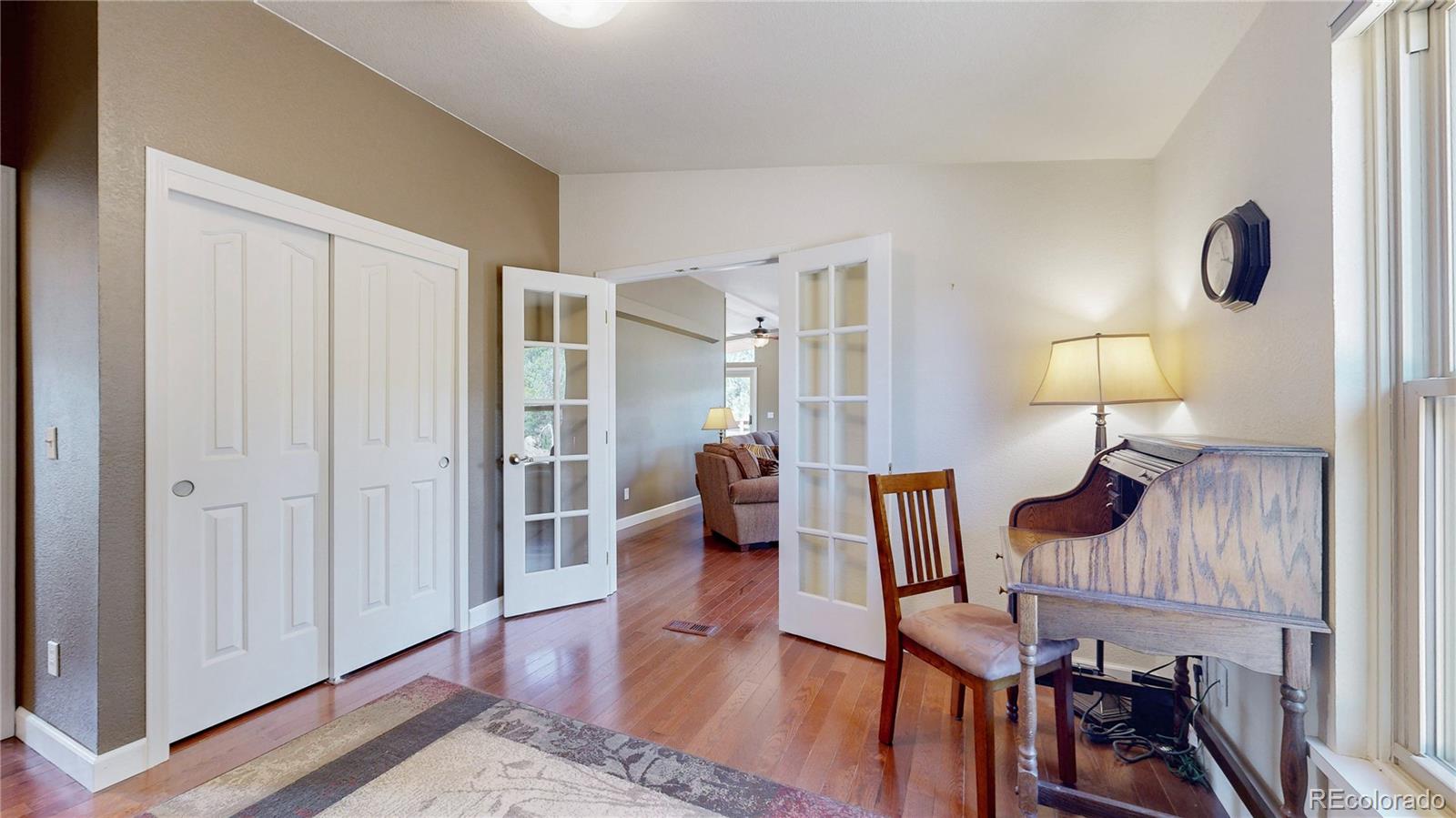 53 O'Brien Road Bailey, CO 80421 - Photo 17 of 49 a view of a livingroom with furniture and hardwood floor