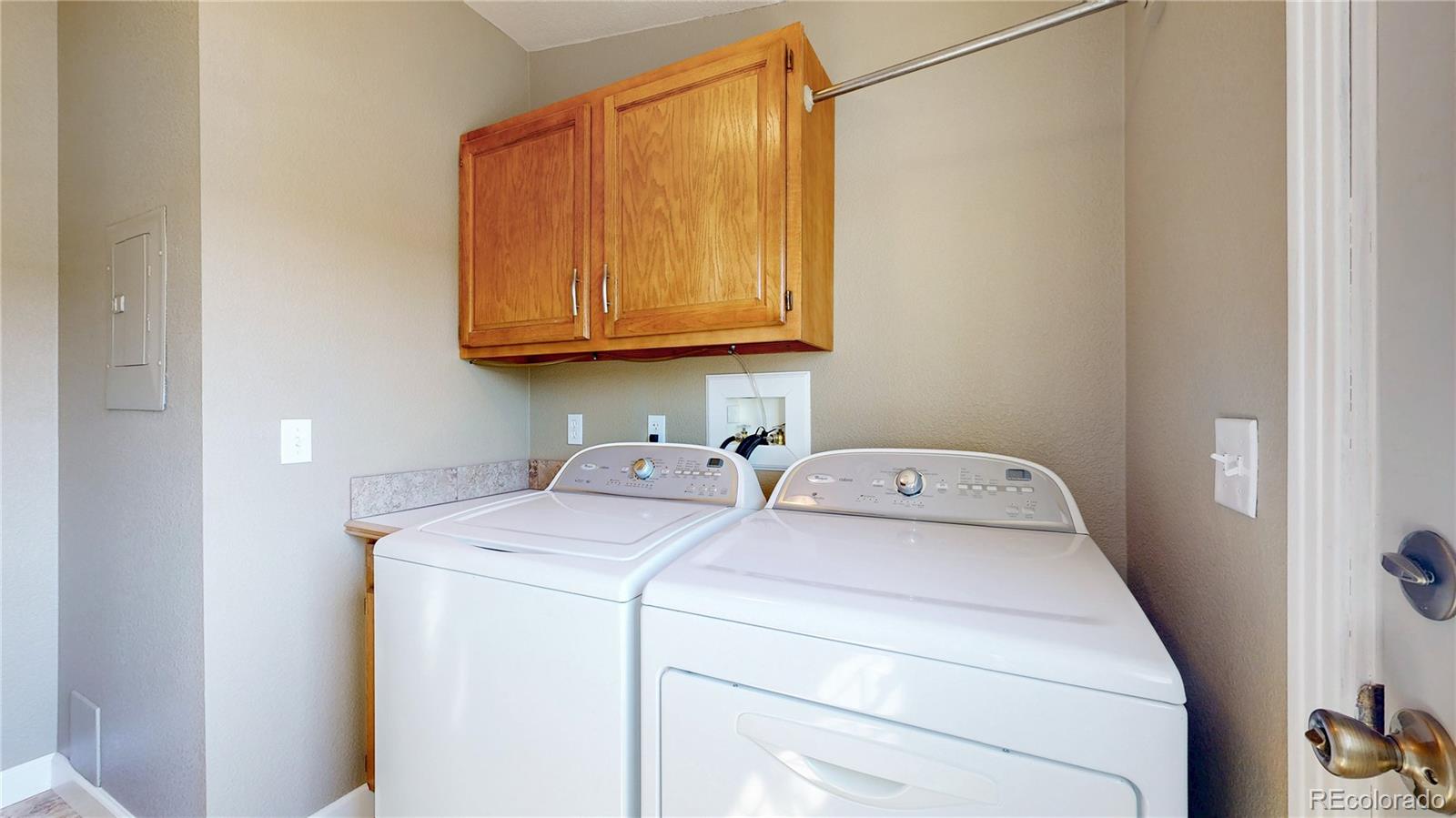 53 O'Brien Road Bailey, CO 80421 - Photo 28 of 49 a utility room with dryer and washer