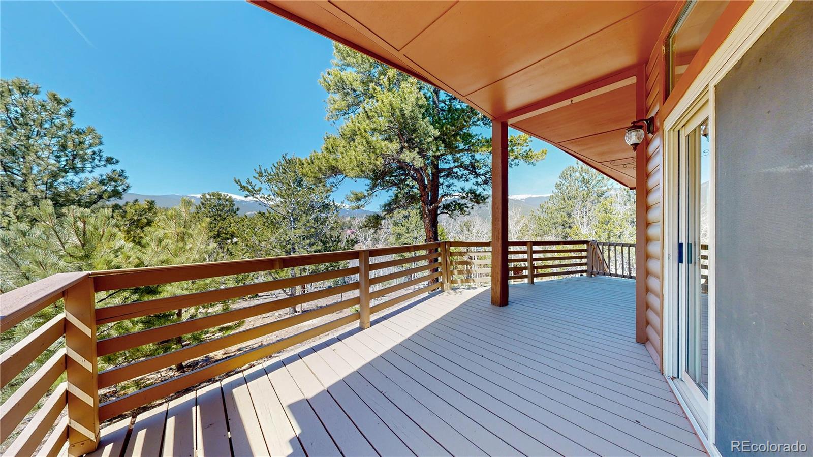 53 O'Brien Road Bailey, CO 80421 - Photo 30 of 49 a view of balcony with wooden floor and fence