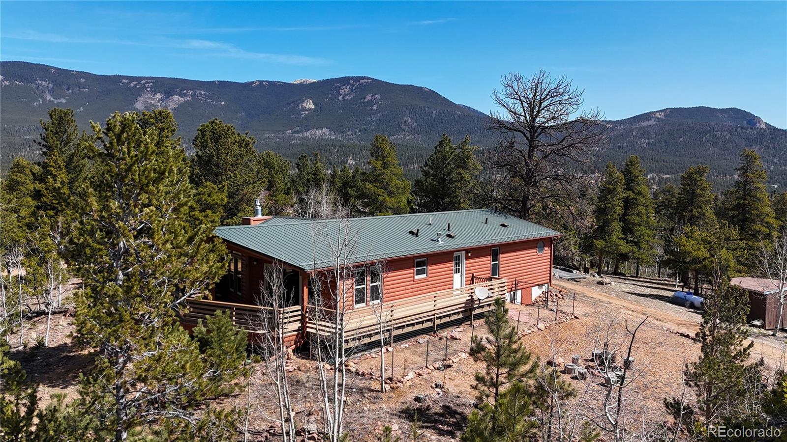 53 O'Brien Road Bailey, CO 80421 - Photo 42 of 49 an aerial view of a house with a yard
