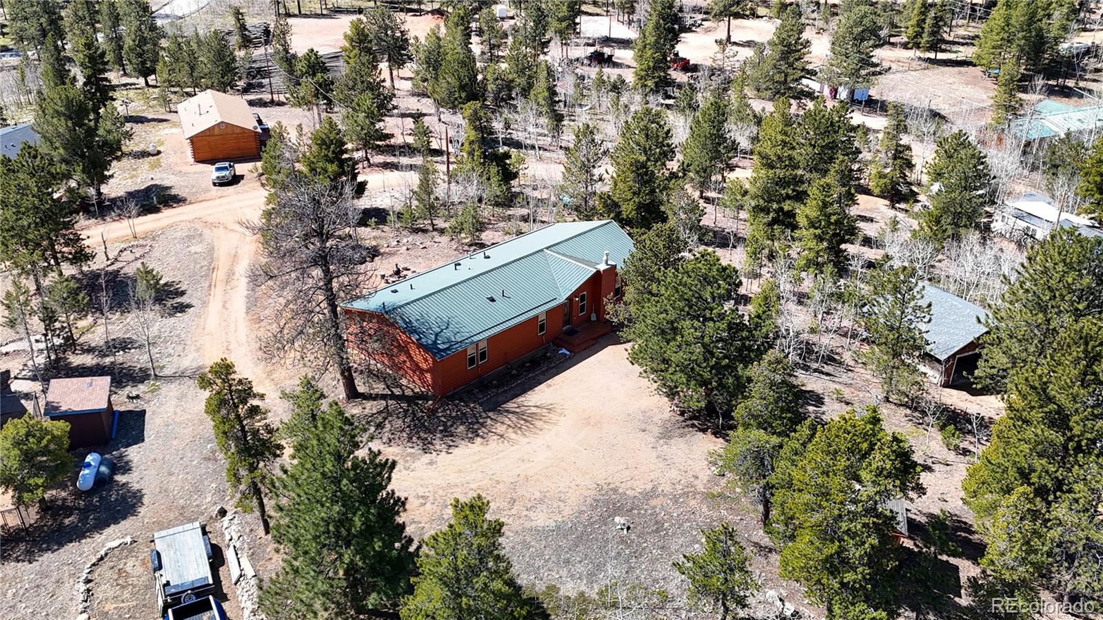 53 O'Brien Road Bailey, CO 80421 - Photo 45 of 49 an aerial view of a house with a yard