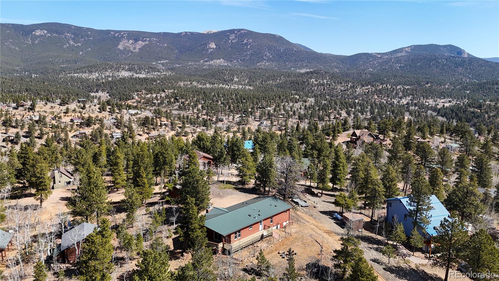 53 O'Brien Road Bailey, CO 80421 - Photo 48 of 49 an aerial view of residential house with yard and mountain view in back