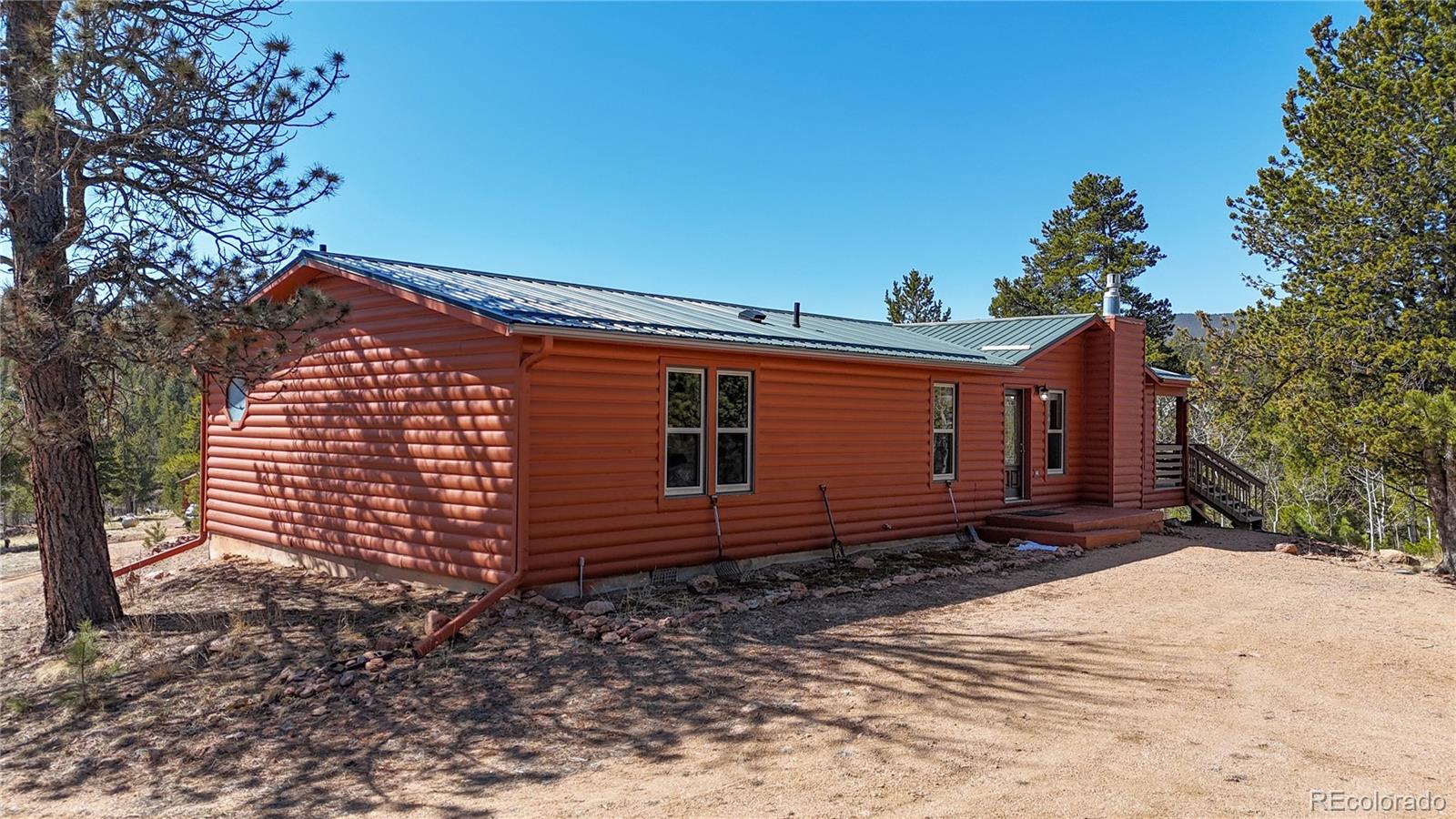 53 O'Brien Road Bailey, CO 80421 - Photo 6 of 49 a front view of a house