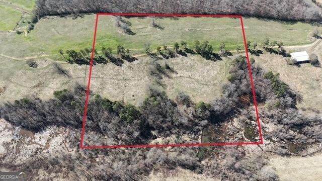 21 Jess Lane Commerce, GA 30530 - Photo 8 of 52 a view of a backyard of a house