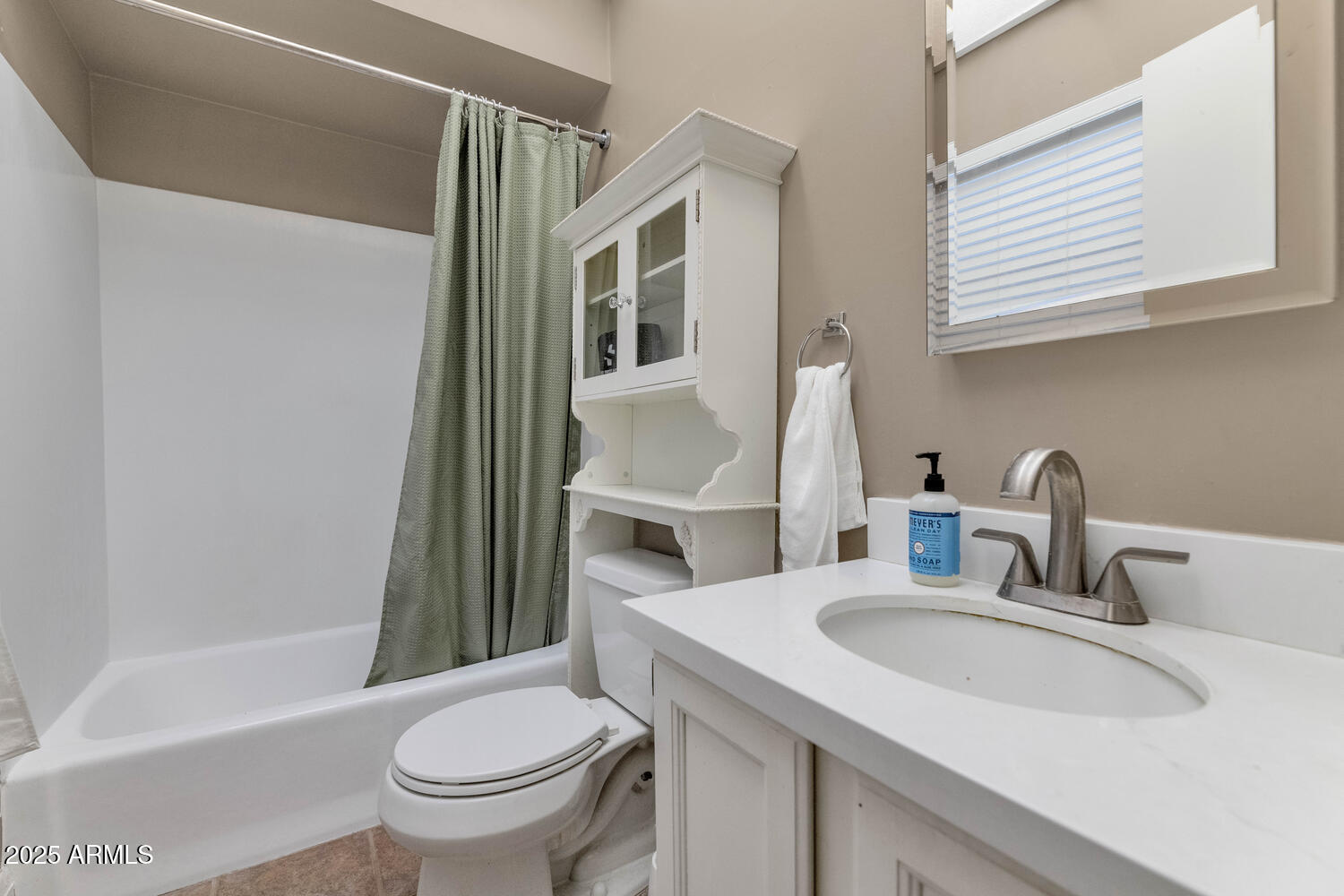 60 East Hoover Avenue Phoenix, AZ 85004 - Photo 13 of 24 a bathroom with a sink toilet and shower