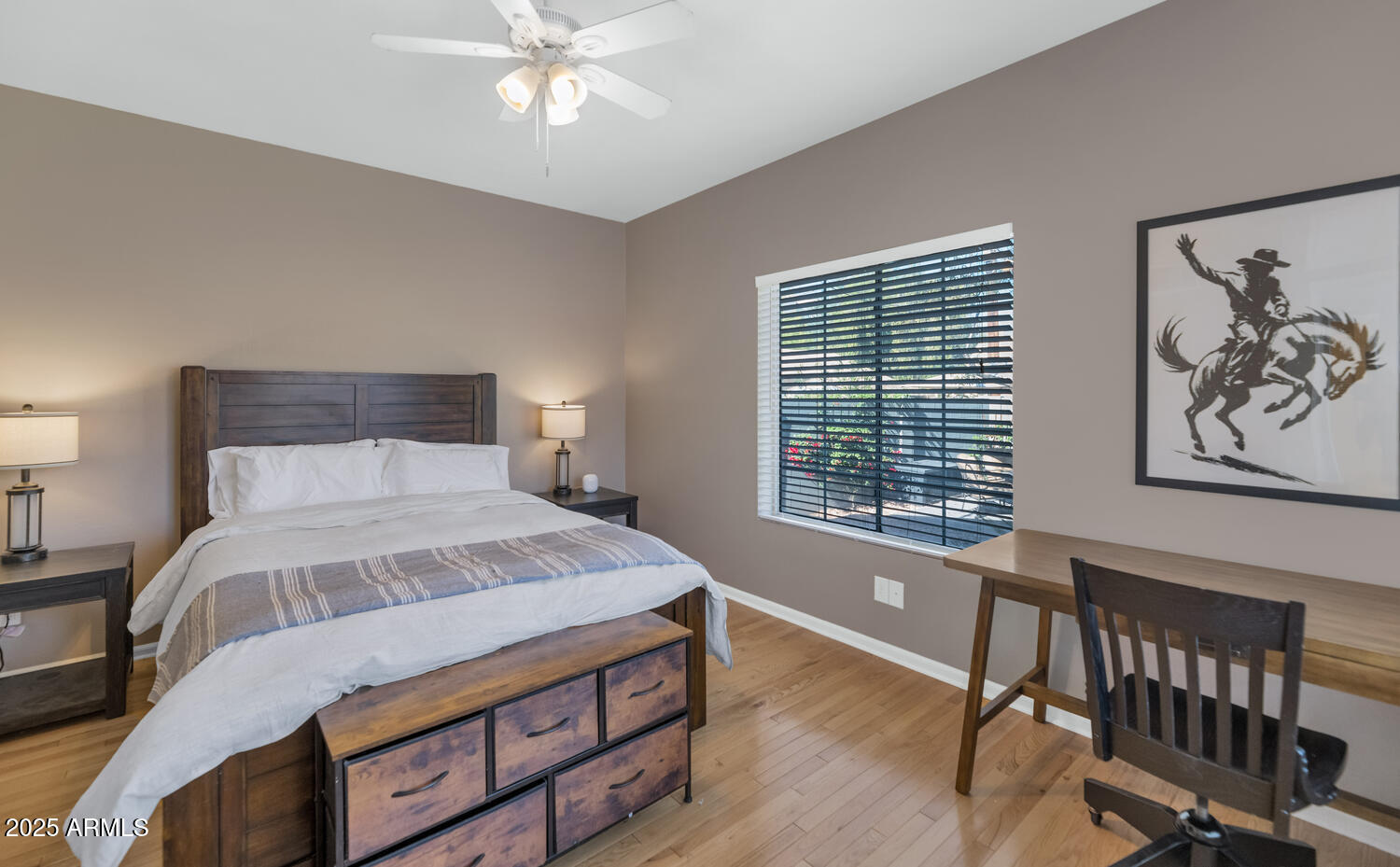 60 East Hoover Avenue Phoenix, AZ 85004 - Photo 14 of 24 a bedroom with a bed and a chandelier