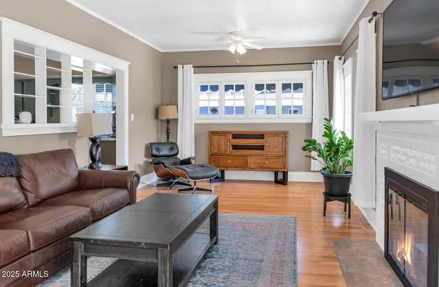 a kitchen with kitchen island a sink stove and refrigerator