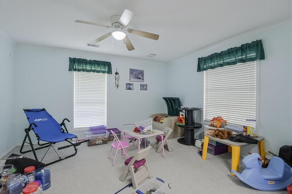 111 Kirk Road Midlothian, TX 76065 - Photo 22 of 40 a bedroom with furniture and a window