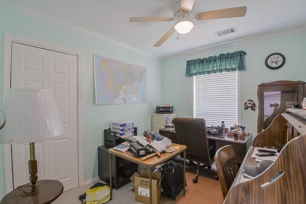 111 Kirk Road Midlothian, TX 76065 - Photo 23 of 40 a work room with furniture and a window