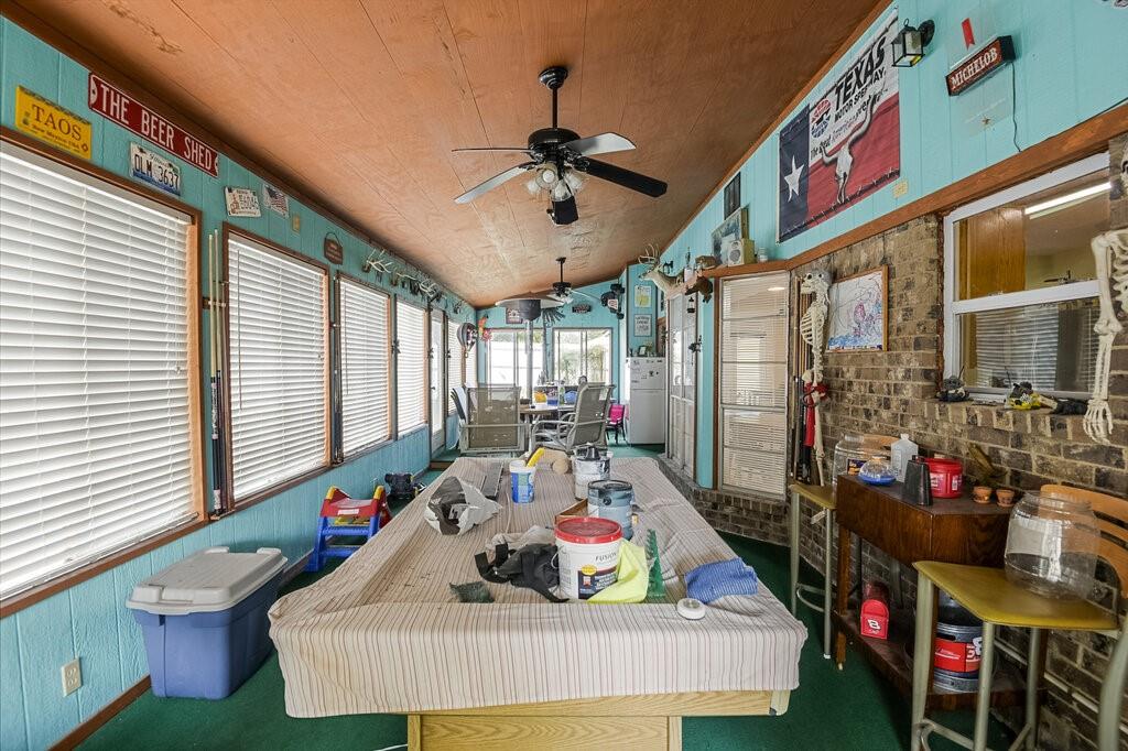 111 Kirk Road Midlothian, TX 76065 - Photo 31 of 40 a living room with furniture and a chandelier