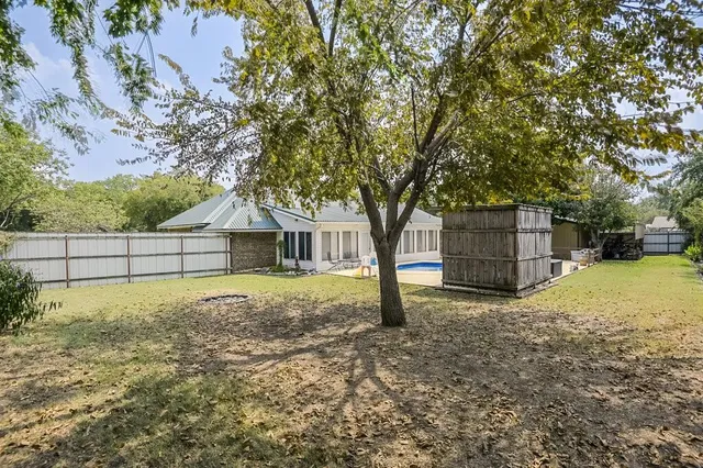 a house with trees in front of it