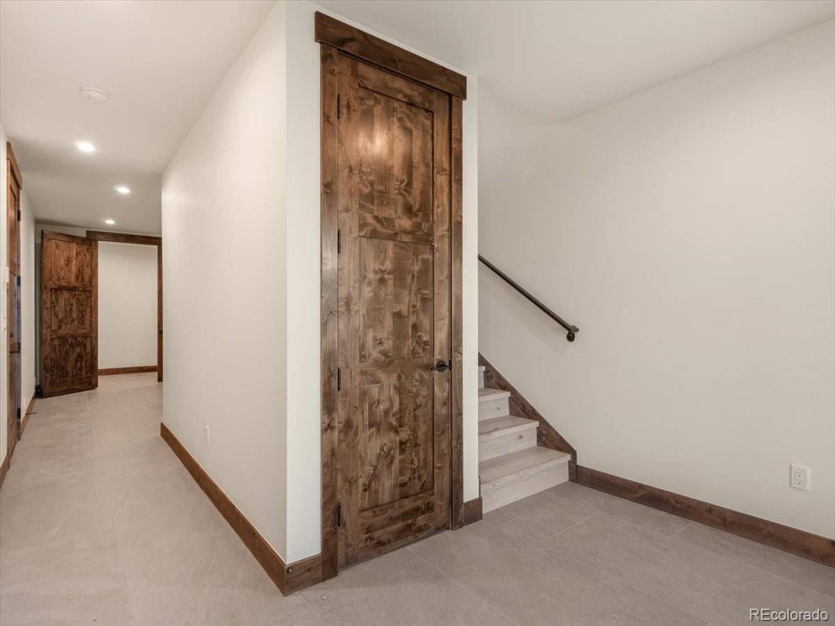 528 Fuller Placer Road Breckenridge, CO 80424 - Photo 24 of 30 a view of an entryway with staircase