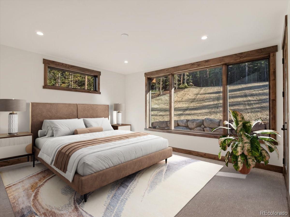 528 Fuller Placer Road Breckenridge, CO 80424 - Photo 10 of 30 a bedroom with a bed and a window