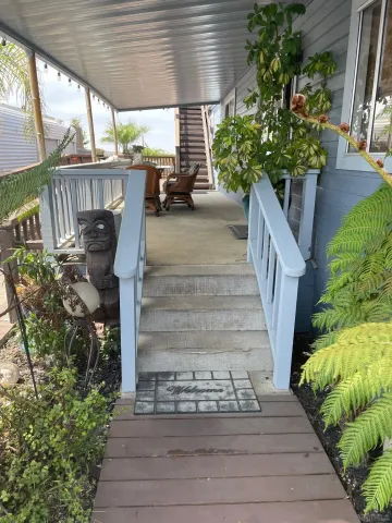 a view of a porch with furniture