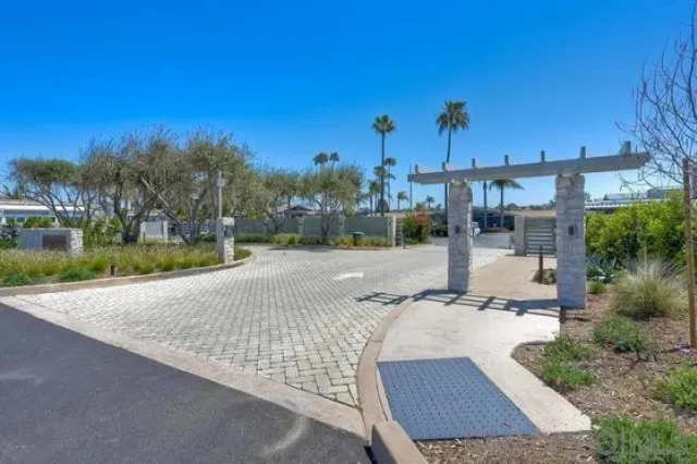 a view of a patio with a table and chairs