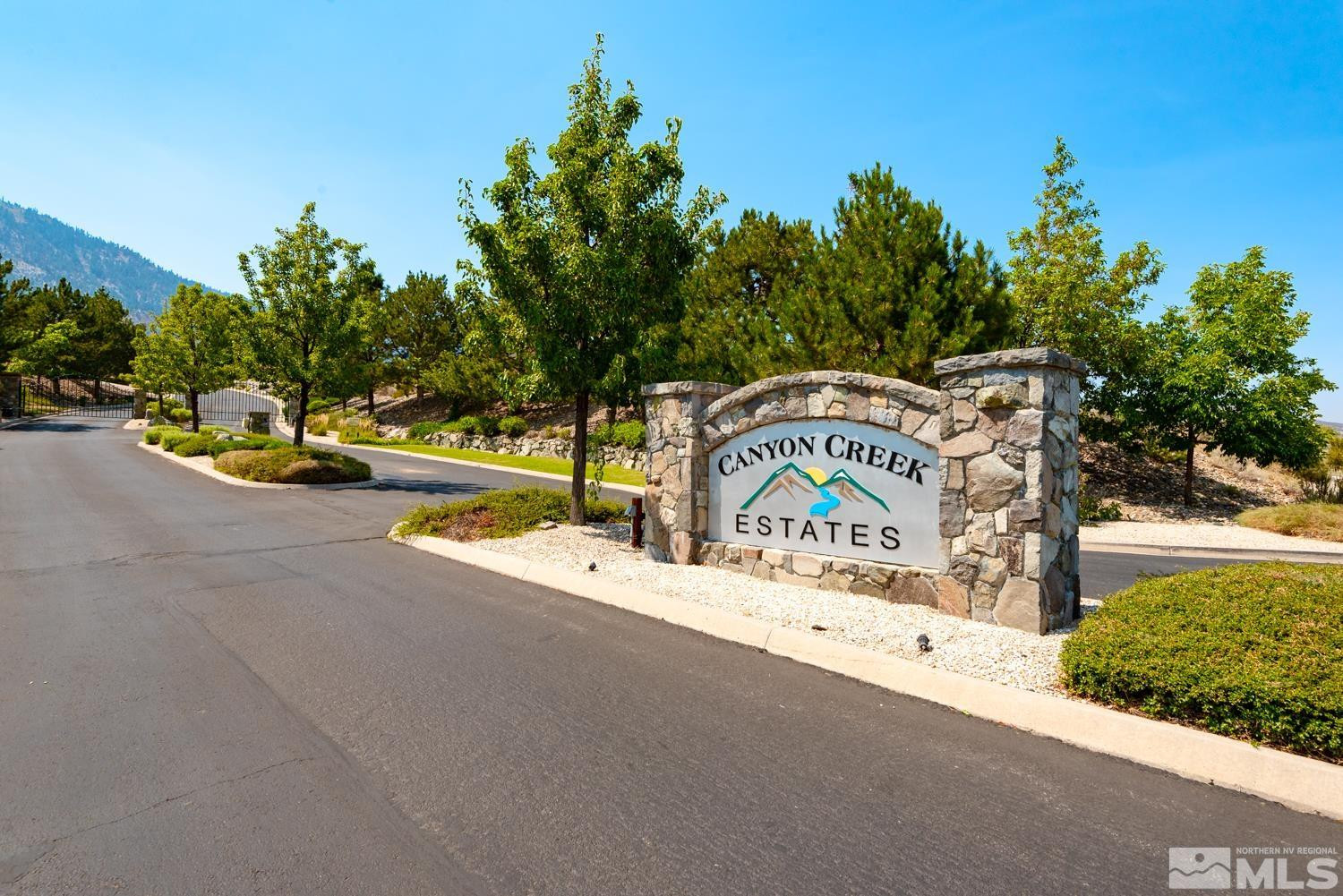 336 James Canyon Loop, Unit 39 Genoa, NV 89411 - Photo 32 of 32 a view of a park with plants and trees