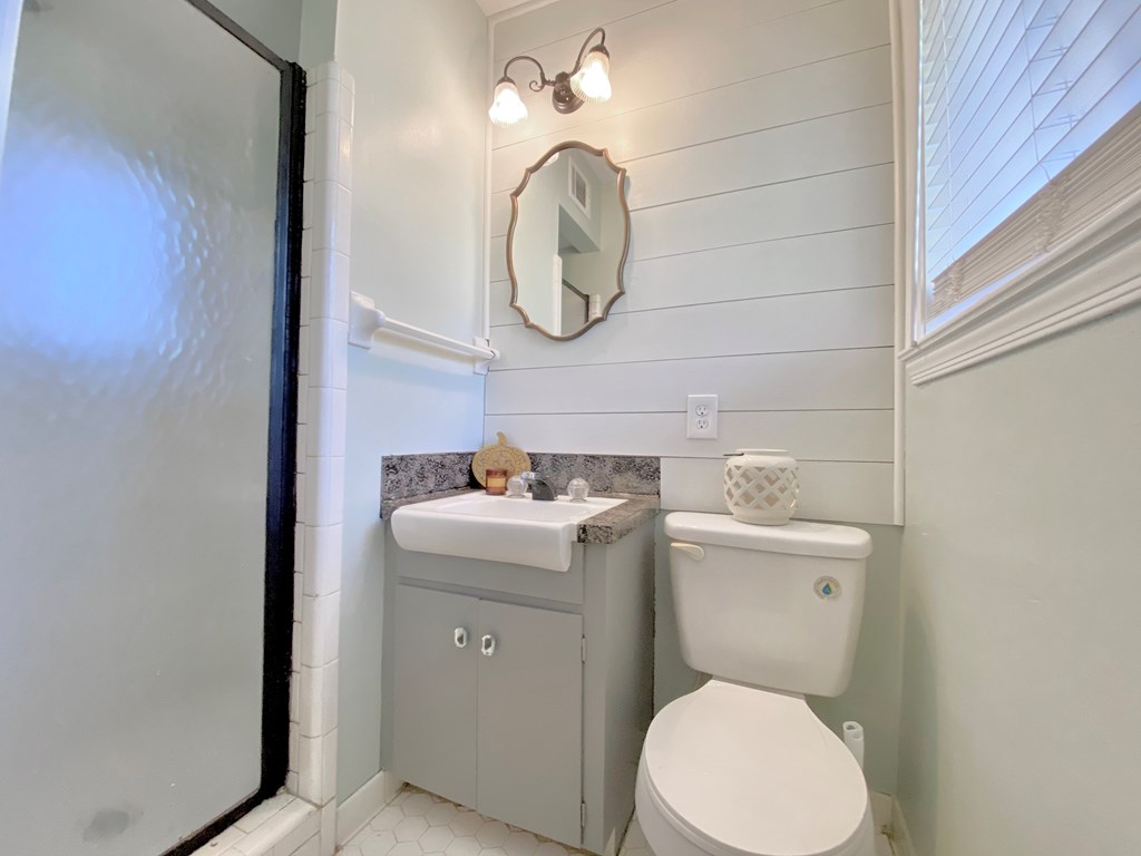 4119 Canady Street Columbus, GA 31909 - Photo 21 of 34 shiplap backsplash with black shower hardware