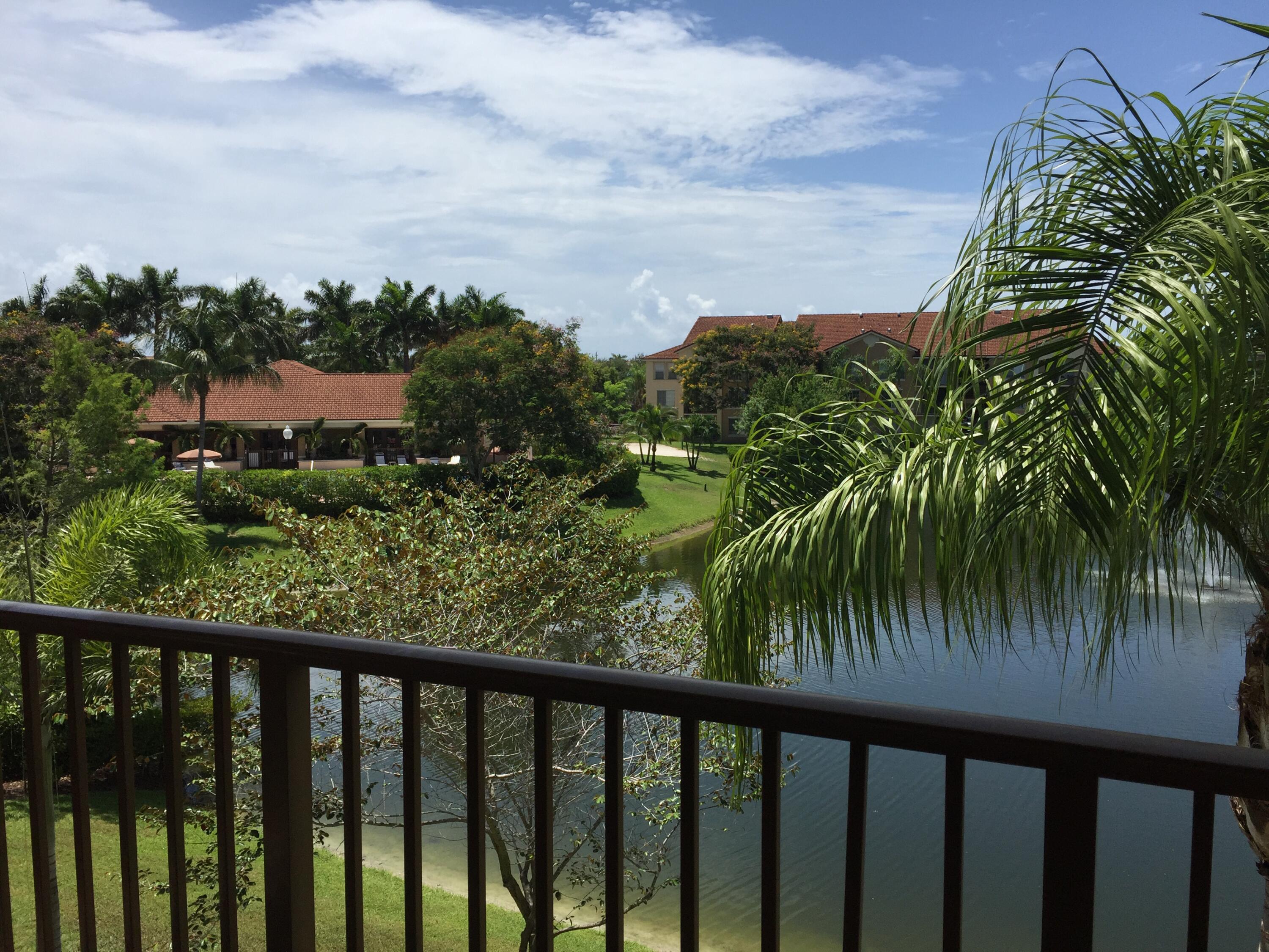 a view of a lake from a balcony