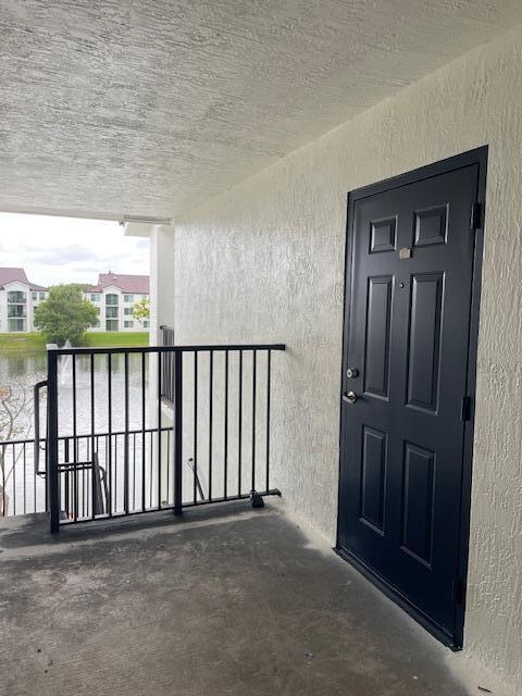 520 Villa Circle Boynton Beach, FL 33435 - Photo 6 of 8 a view of a porch