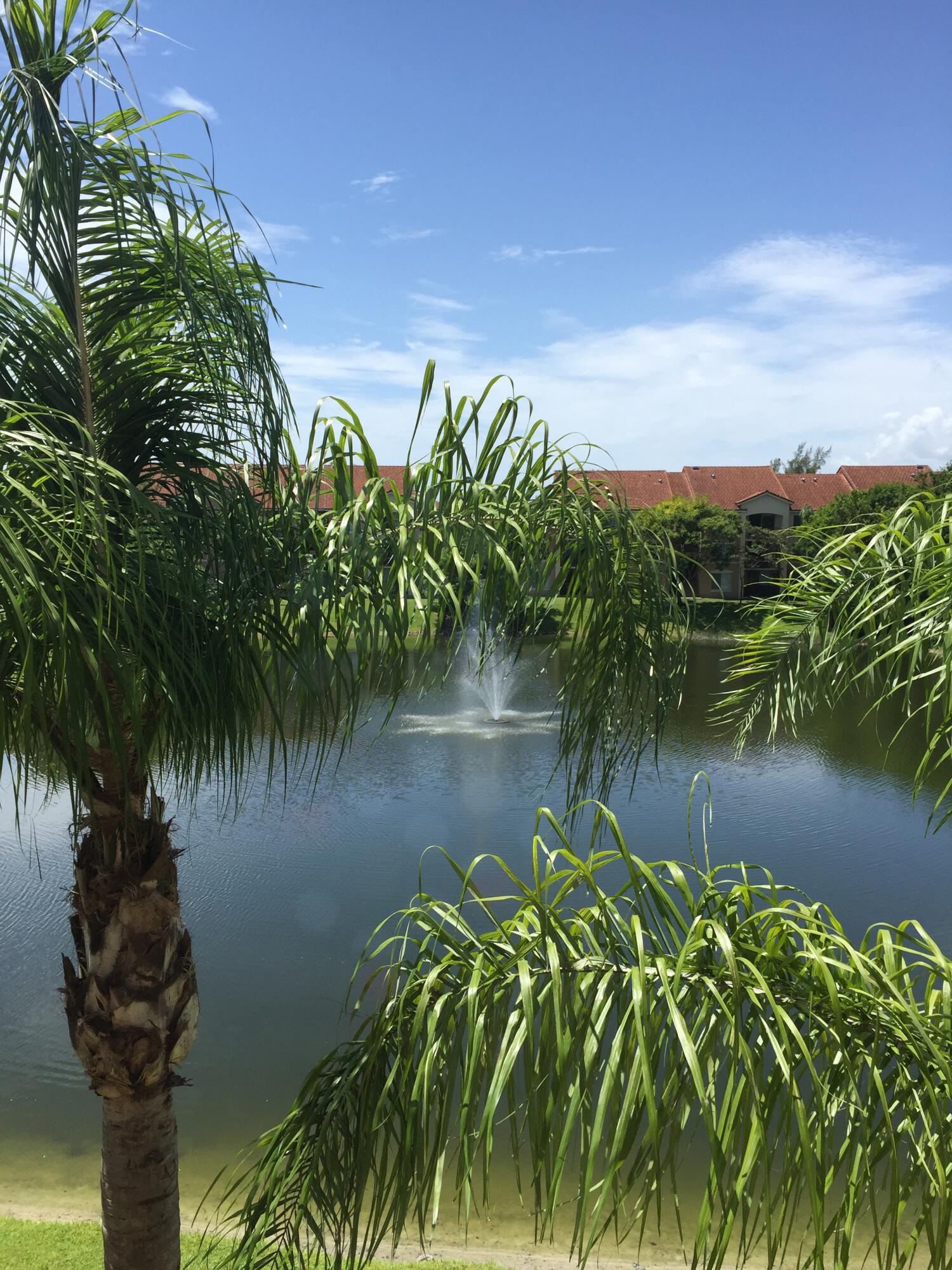 520 Villa Circle Boynton Beach, FL 33435 - Photo 7 of 8 a lake view with a lake view