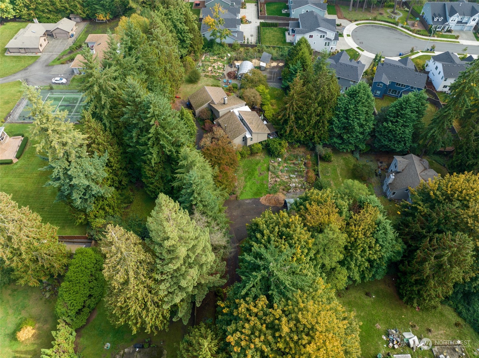 23813 Meridian Avenue South Bothell, WA 98021 - Photo 4 of 10 an aerial view of residential houses with outdoor space and trees