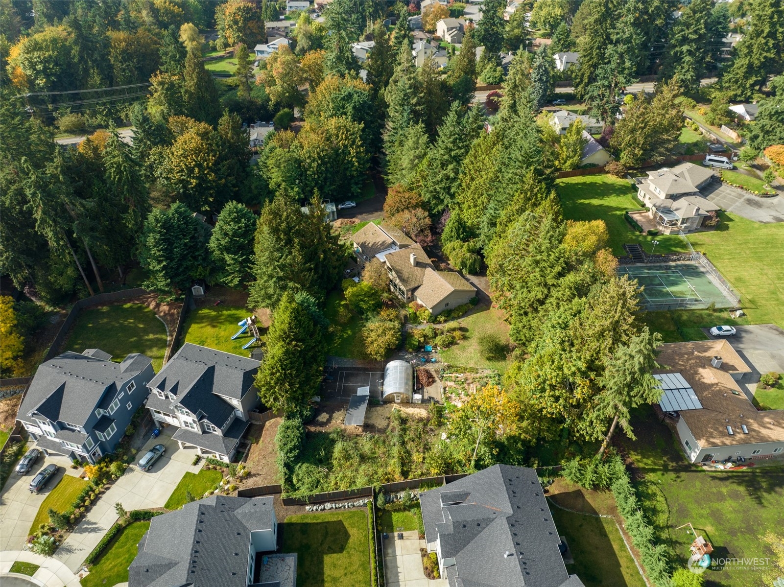 23813 Meridian Avenue South Bothell, WA 98021 - Photo 5 of 10 an aerial view of residential houses with outdoor space