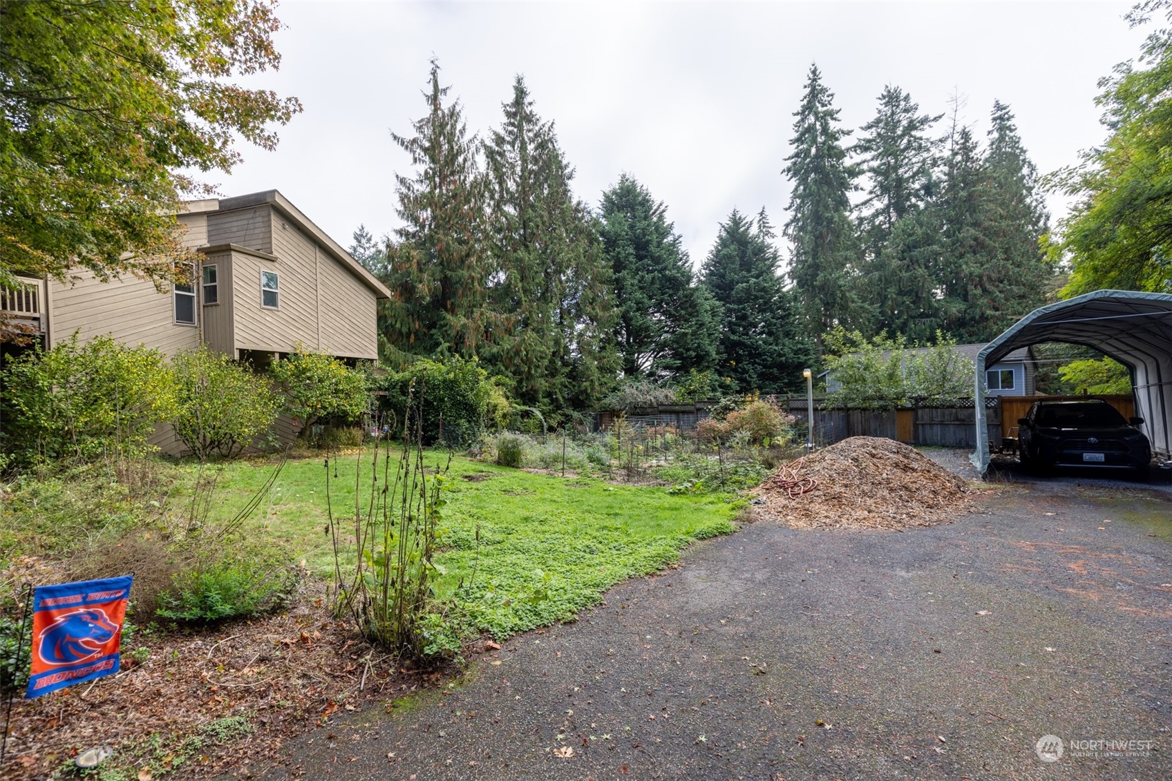 23813 Meridian Avenue South Bothell, WA 98021 - Photo 9 of 10 a view of a house with backyard and garden
