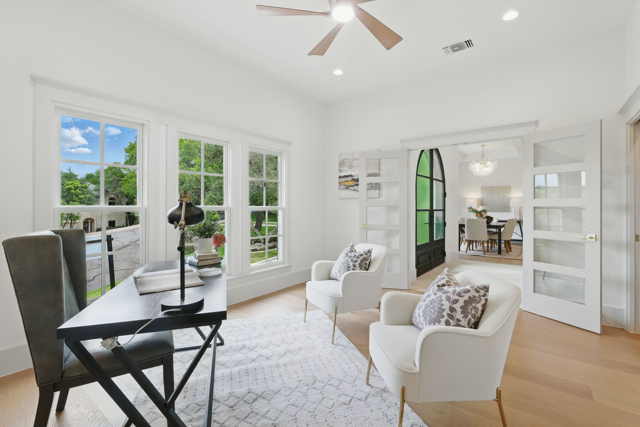 6905 Rudi Cove Austin, TX 78759 - Photo 9 of 36 a living room with furniture and a large window
