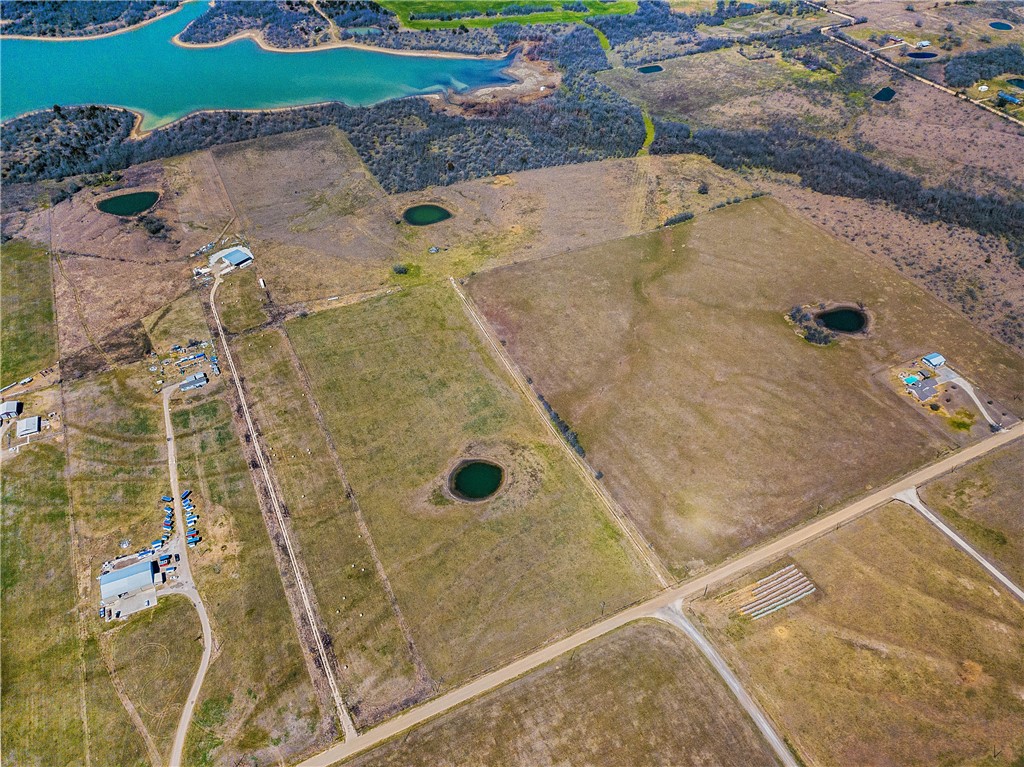 1253 Steinke Road Mart, TX 76664 - Photo 3 of 13 Aerial view of sparsely populated area featuring a large body of water