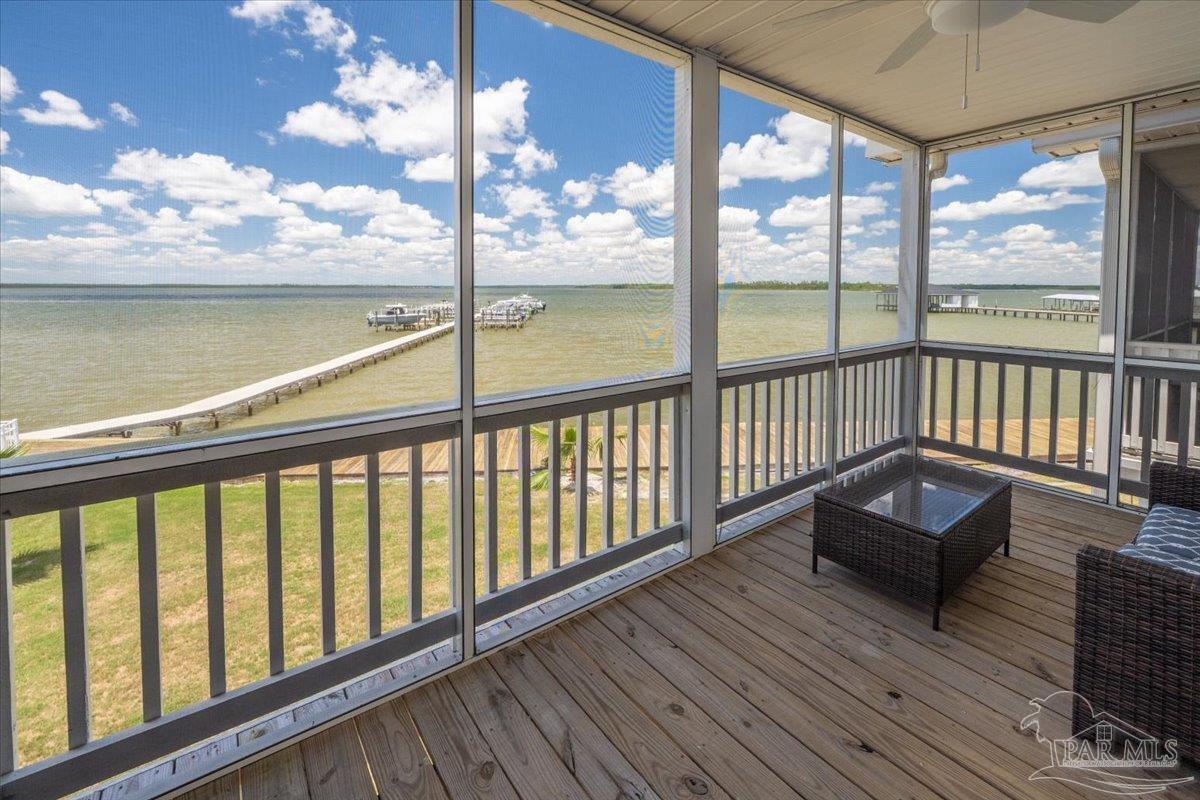 26063 Canal Road, Unit 3F Orange Beach, AL 36561 - Photo 51 of 72 a view of a balcony with wooden floor