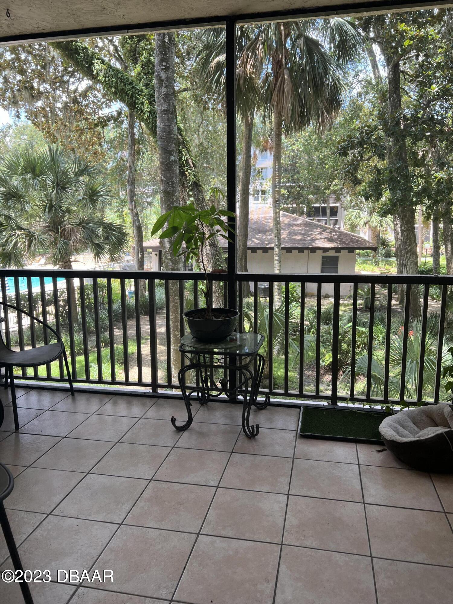 640 North Nova Road, Unit 204 Ormond Beach, FL 32174 - Photo 13 of 17 a view of a balcony with chairs