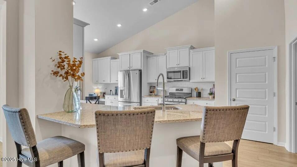 8667 Baton Rouge Avenue Northwest Calabash, NC 28467 - Photo 3 of 17 crs_1946_pic_stphillips_kitchen_1of2_f1