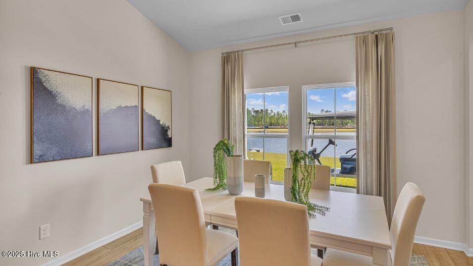 8667 Baton Rouge Avenue Northwest Calabash, NC 28467 - Photo 6 of 17 crs_1946_pic_stphillips_dining_2of2_f1