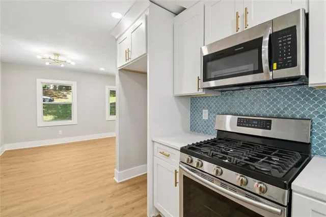 a bathroom with a sink and a window