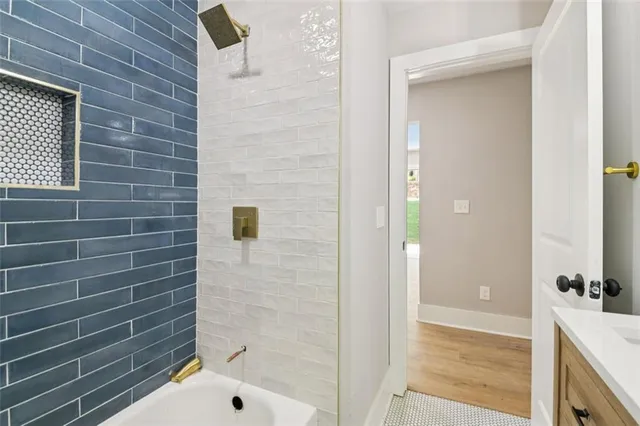 a bathroom with a sink a toilet and a bathtub