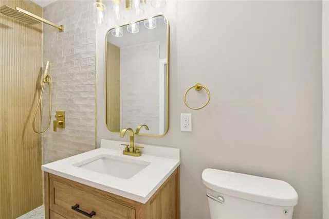 a bathroom with a sink a vanity and a mirror