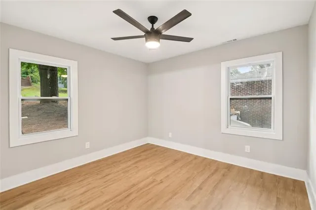 a view of backyard with green space