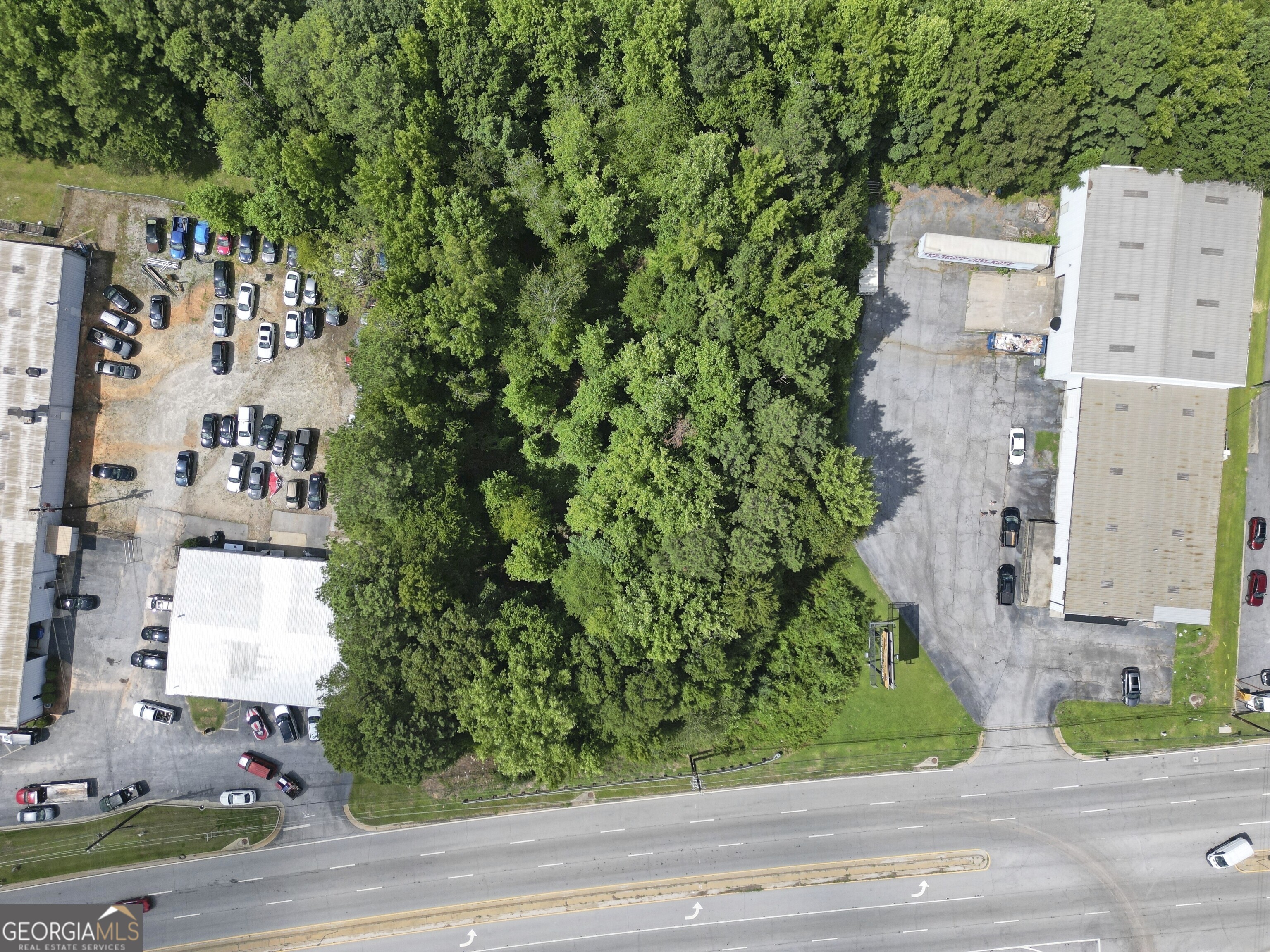 2095 Sigman Road Northwest Conyers, GA 30012 - Photo 10 of 11 a aerial view of a house with a yard and garden