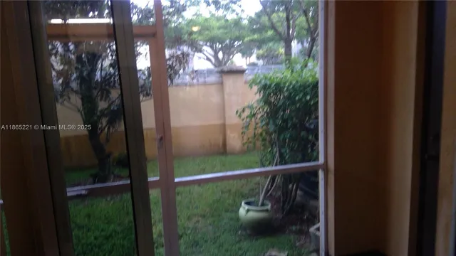 a balcony with small yard